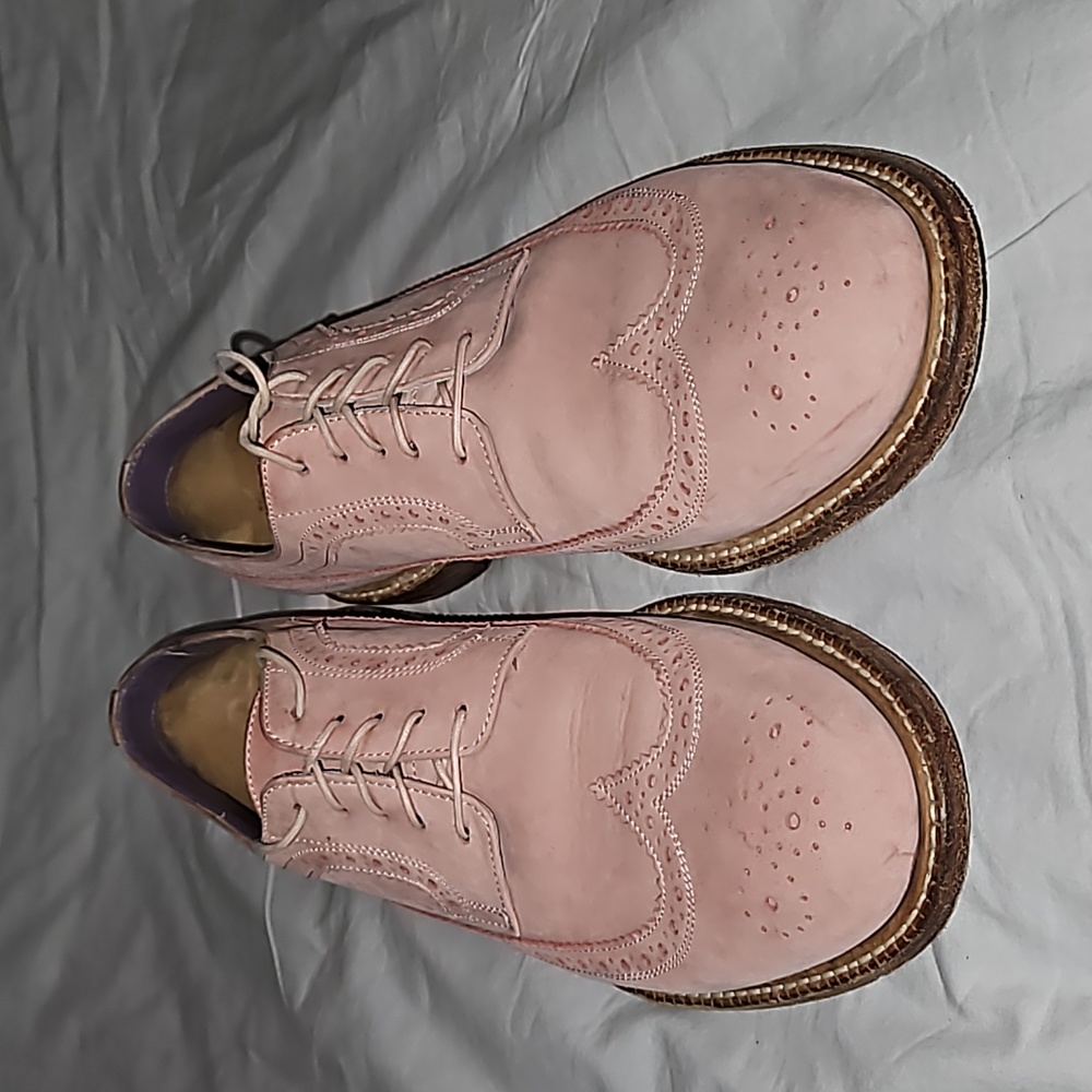 Paul Smith pink wingtip derbys.